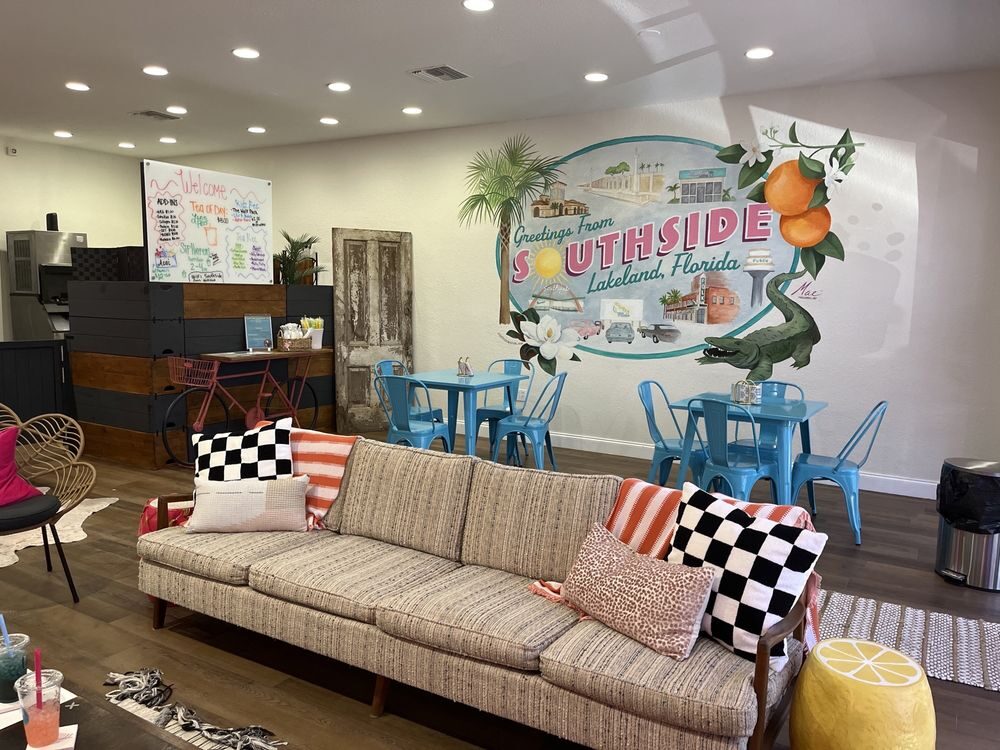 Bright retro interior with the Greetings from Southside Lakeland mural